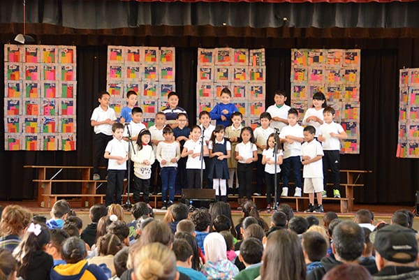 kids on stage at school