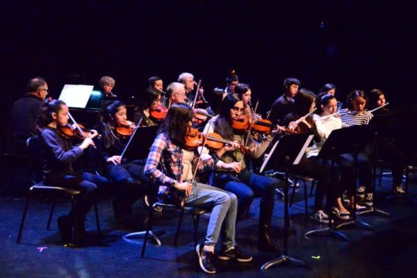 Musicianship kids playing in orchestra