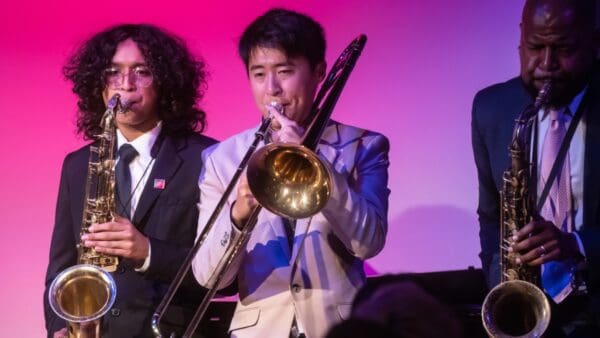 teenager kids playing trumpets